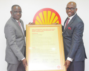 Change of guards at SNEPCo Bayo Ojulari took over as Managing Director of Shell Nigeria Exploration and Production Company from Tony Attah on November 1, 2015. Picture shows Mr. Attah (right) handing over the Health, Safety, Security and Environment (HSSE) Charter of SNEPCo to Mr. Ojulari in keeping with the tradition of environment-friendly operations by the deep-water subsidiary of Shell in Nigeria...  New Managing Director of the Shell Nigeria Exploration and Production Company Limited (SNEPCo), Mr. Bayo Ojulari (left) taking over the Shell Commitment and Policy on Health, Security, Safety, The Environment and Social Performance from his predecessor, Mr. Tony Attah, at a formal leadership change event at the company's headoffice in Lagos.