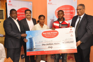  L-R, Regional Operations Director, Lagos Region, Airtel, Oladokun Oye; Vice President, Segment, Usage & Retention, Dinesh Balsingh; One Million Naira winner, Mrs. Eze Sonlove and her husband with Chief Commercial Officer, Airtel Nigeria, Ahmed Mokhles during the prize presentation to winners in the Airtel Red Hot Promo Season 3, held in Lagos recently.