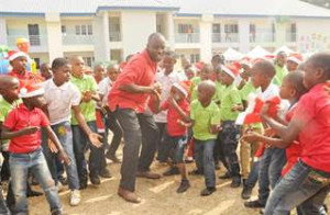 The General Manager, Offshore Assets of the Shell Nigeria Exploration and Production Company Limited (SNEPCo), Mr. Effy Okon, in a dance with pupils of the Innercity Mission School, Ikeja, Lagos, at the SNEPCo-sponsored 2015 Christmas party recently.