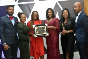L-R, NASCON And Allied Company plc, Kingsley Emeh, HSSE, Idogesit Udoh, NASCON, Risk Analyst, Ifeoluwa Adeniyi, CFO's Office, Diseye Oba, HSSE & Sustainability, Morayo Tukuru, Investor relations, John Udeh HSSE,  with the Best Company in Genders Women Empowerment Award at The SERAS Award 2022