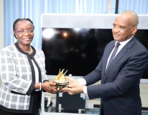 L-R: Director General, Nigerian Maritime Administration and Safety Agency (NIMASA), Dr Bashir Jamoh, OFR (left) presenting a souvenir to the Director Legal/ Board Secretary of Ghana Maritime Authority (GMA), Mrs. Patience Diaba during a study visit by members of the Ghana Maritime Authority at the NIMASA headquarters in Lagos.