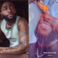 Angry Youths Destroy Davido's poster In Maiduguri